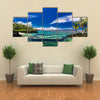 Natural infinity rock pool with palm trees over tropical ocean lagoon multi panel canvas wall art