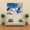 A volleyball player jumps to spike while another prepares to competition Multi panel canvas wall art