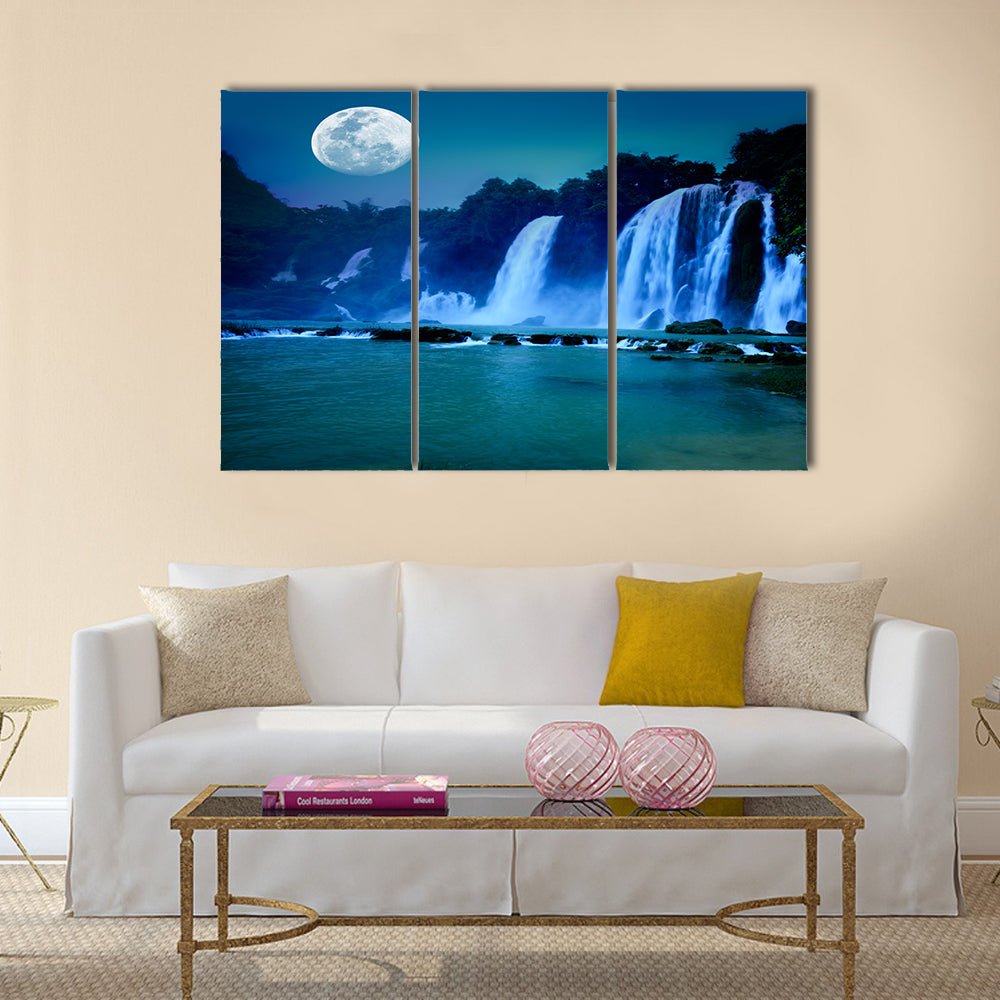 Beautiful waterfall under moonlight at night time Multi Panel Canvas Wall Art