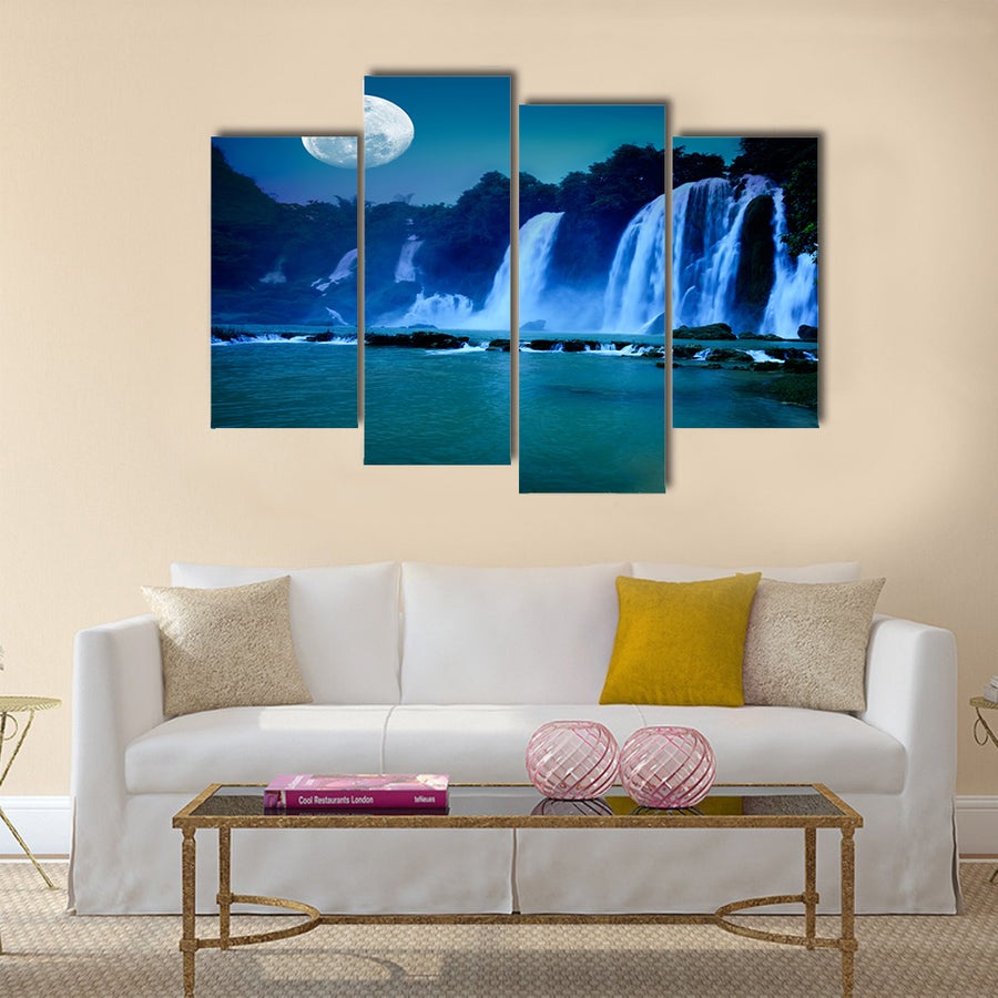 Beautiful waterfall under moonlight at night time Multi Panel Canvas Wall Art