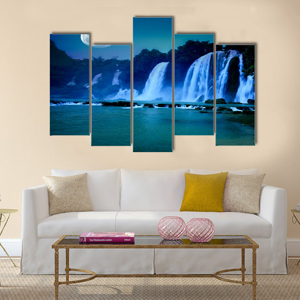 Beautiful waterfall under moonlight at night time Multi Panel Canvas Wall Art