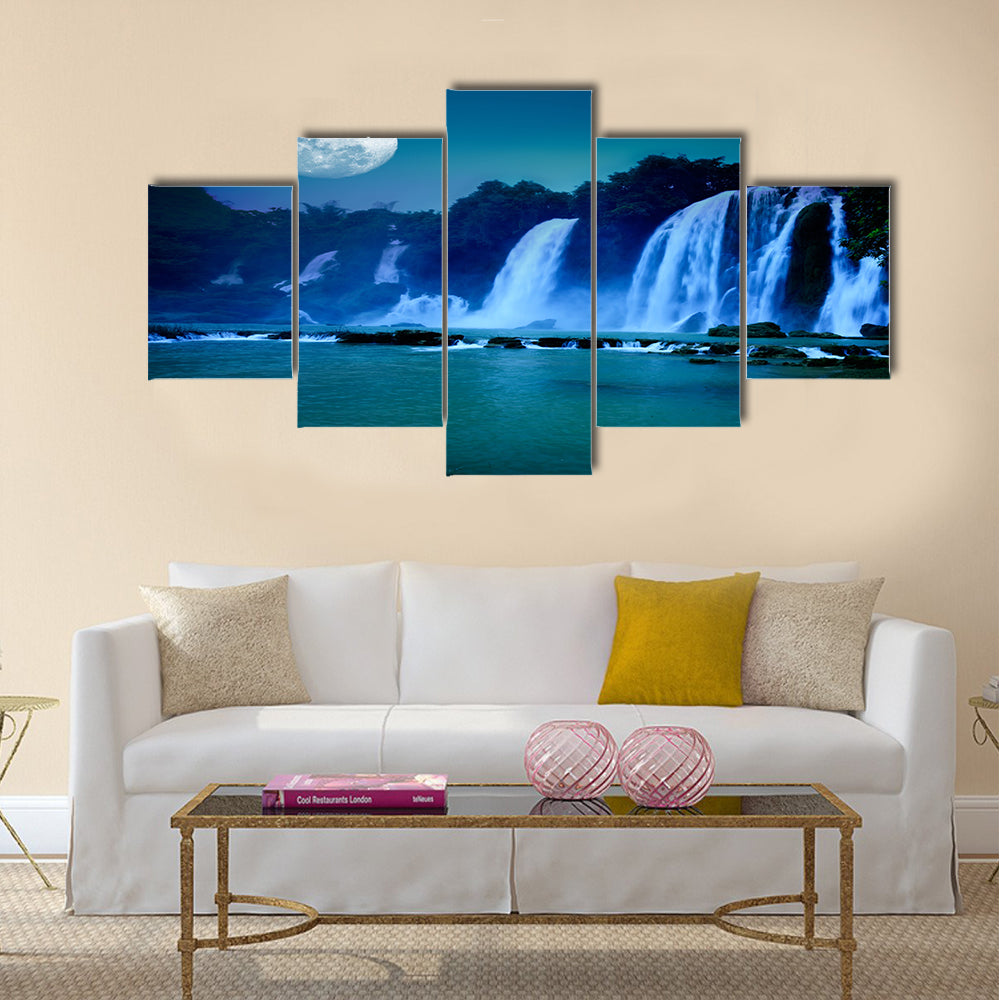 Beautiful waterfall under moonlight at night time Multi Panel Canvas Wall Art