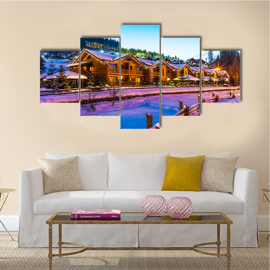 Ski Resort with Snowy House and Skiing Slope in Bukovel, Ukraine Multi Panel Canvas Wall Art
