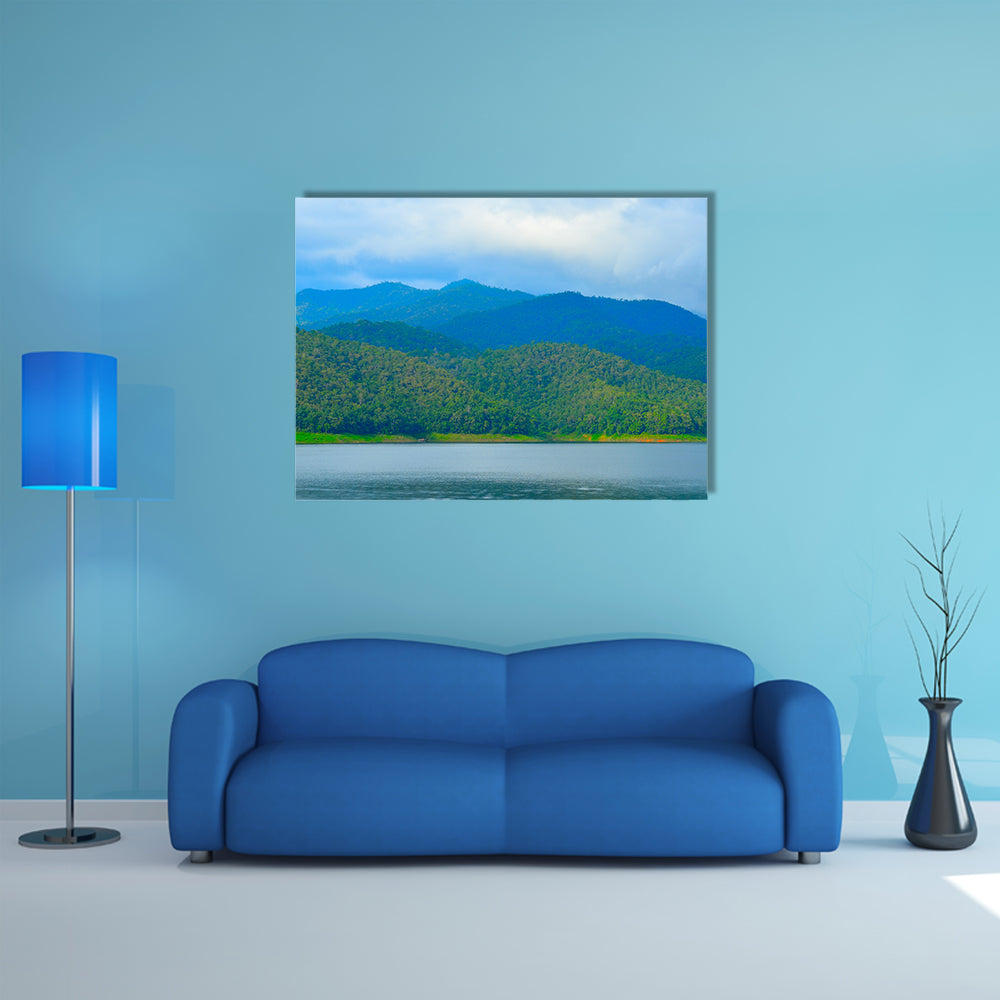 View of mountain forest landscape with heavy blue sky multi panel canvas wall art