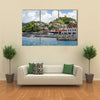 Many Colorful Homes on Grenada Hillside Multi panel canvas wall art