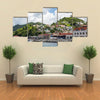 Many Colorful Homes on Grenada Hillside Multi panel canvas wall art