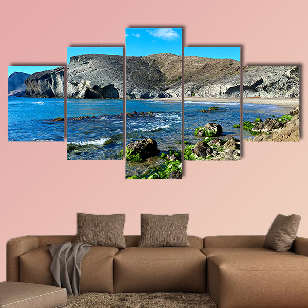 Volcanic rock-formations at Playa de Monsul multi panel canvas wall art