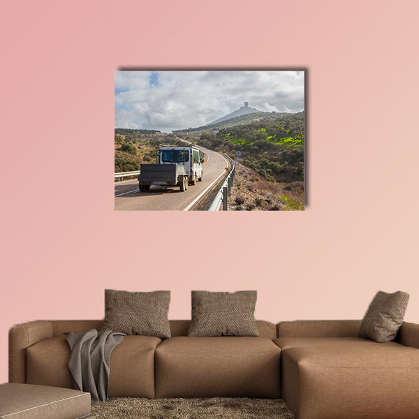 Van with trailer moving towards Feria Castle Hill, Extremadura, Spain multi panel canvas wall art