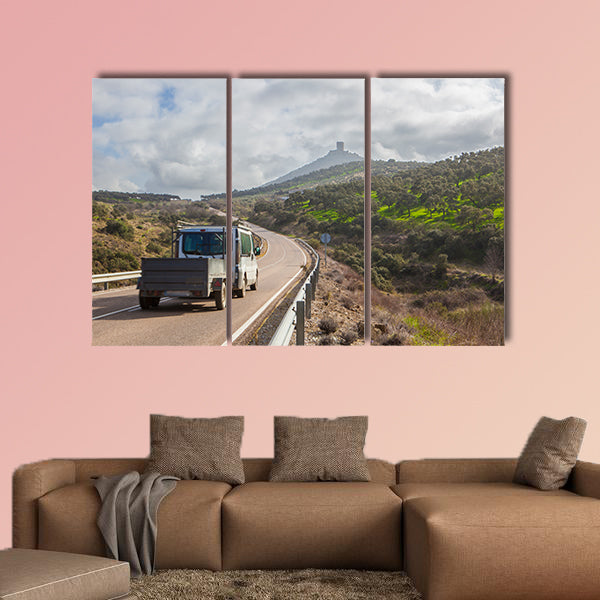 Van with trailer moving towards Feria Castle Hill, Extremadura, Spain multi panel canvas wall art