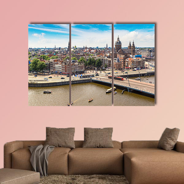 Canal and St. Nicolas Church in Amsterdam multi panel canvas wall art