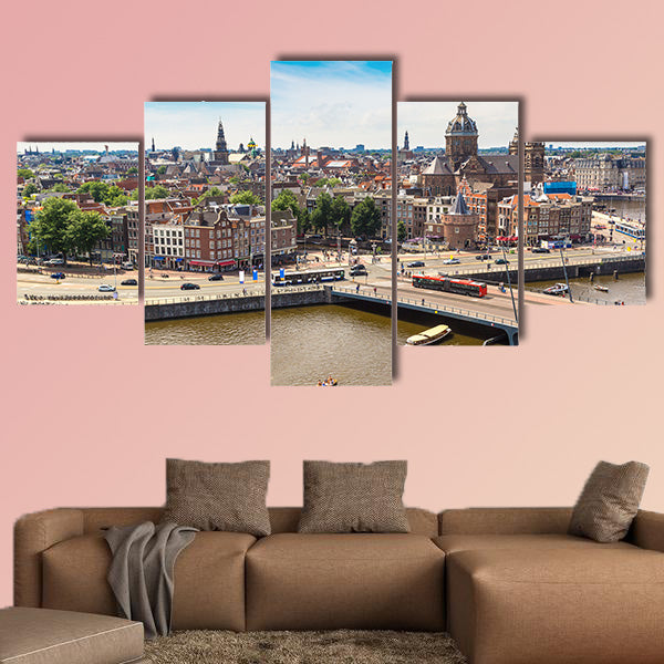 Canal and St. Nicolas Church in Amsterdam multi panel canvas wall art
