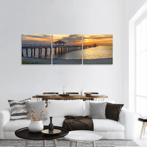 Wooden bridge laying to the sea at sunset Panoramic canvas Wall Art