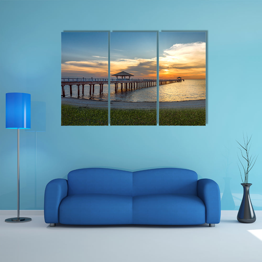 A Wooden Bridge Over A Sea Under The Sunset Multi Panel Canvas Wall Art