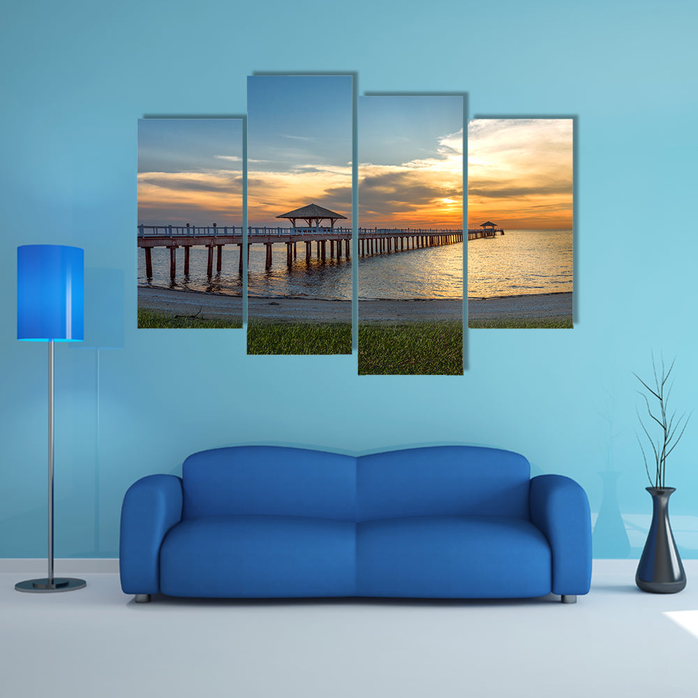 A Wooden Bridge Over A Sea Under The Sunset Multi Panel Canvas Wall Art