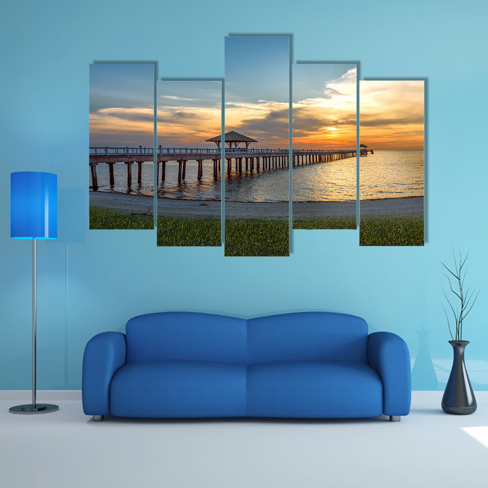 A Wooden Bridge Over A Sea Under The Sunset Multi Panel Canvas Wall Art