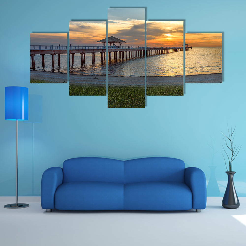 A Wooden Bridge Over A Sea Under The Sunset Multi Panel Canvas Wall Art