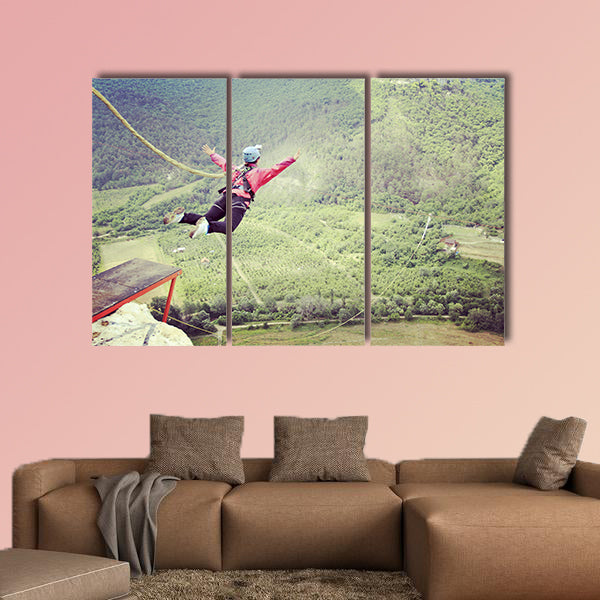 Jump off a cliff into a canyon with a rope Multi panel canvas wall art