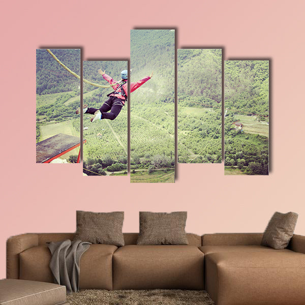 Jump off a cliff into a canyon with a rope Multi panel canvas wall art