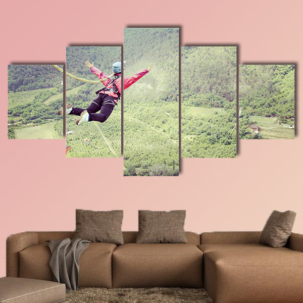 Jump off a cliff into a canyon with a rope Multi panel canvas wall art