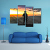 Army rangers on the sunrise in the mountains Multi panel canvas wall art