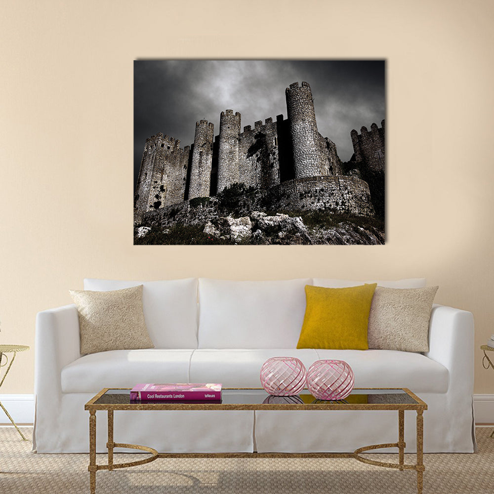 Disturbing scene with medieval castle at night with stormy sky Multi Panel Canvas Wall Art
