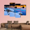 Winter shot of Lake Tahoe with snow on rocks  multi panel canvas wall art