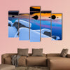 Winter shot of Lake Tahoe with snow on rocks  multi panel canvas wall art