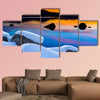 Winter shot of Lake Tahoe with snow on rocks  multi panel canvas wall art