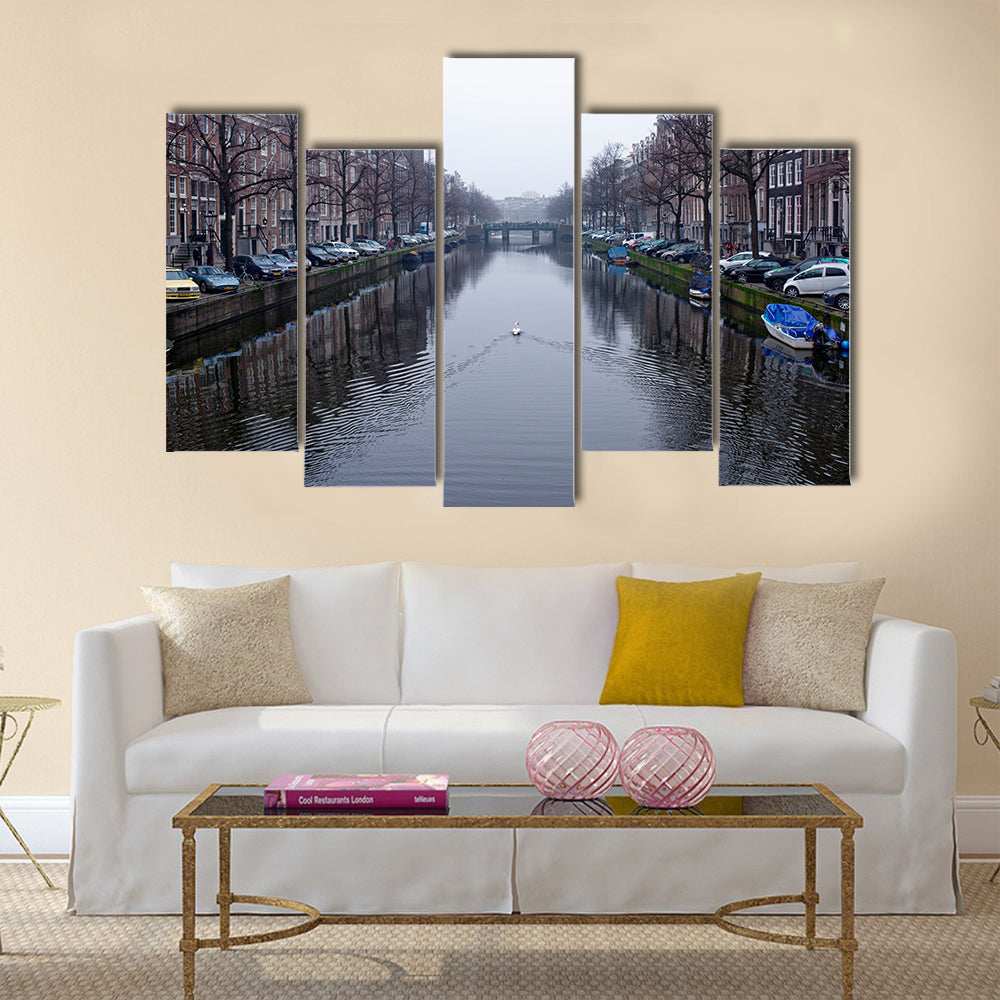 Along the canal walk citizens and moving vehicles Multi panel canvas wall art