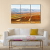 Blur in lesotho malealea street village near mountain and Cultivation field Multi Panel Canvas Wall Art