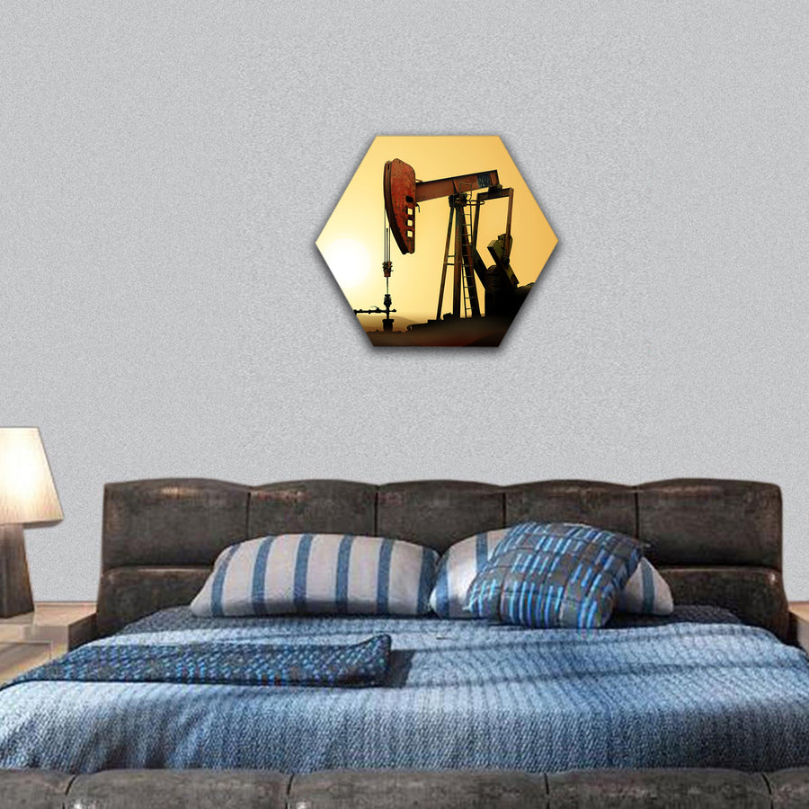 Working oil pump in deserted district at sunset hexagonal canvas wall art