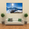 People are resting in the ski resort of Andorra in the mountains Multi panel canvas wall art