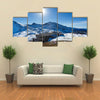 People are resting in the ski resort of Andorra in the mountains Multi panel canvas wall art