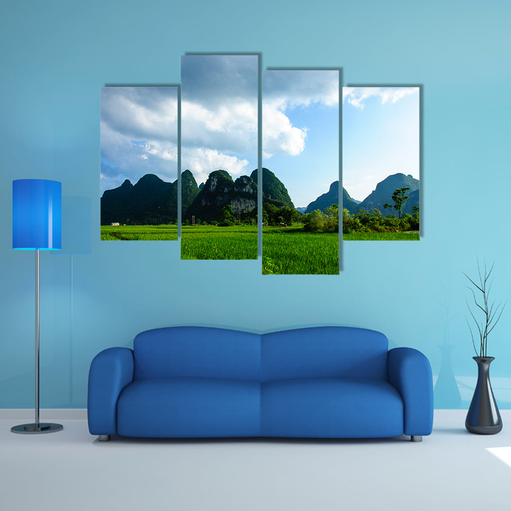 Karsts mountains and rural scenery in summer multi panel canvas wall art