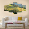 landscape in a rural area  of harvest under the yellow sunlight of autumn Multi panel canvas wall art