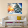 Sunlight breaks through the pine trees in winter. Multi panel canvas wall art