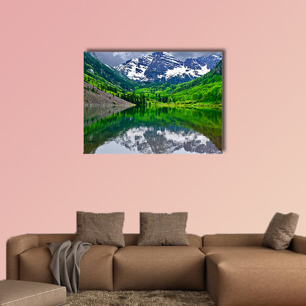 Mountain peak reflection in calm lake. Maroon Bells near wall art