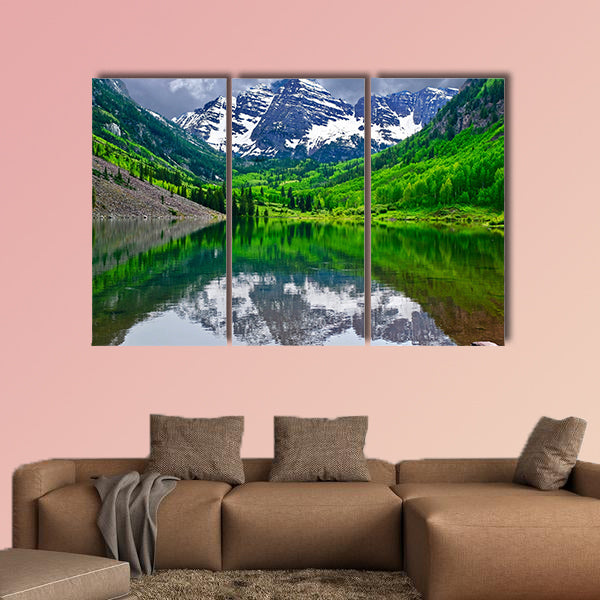 Mountain peak reflection in calm lake. Maroon Bells near wall art