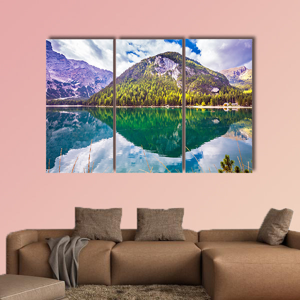Emerald expanse of water reflects the surrounding canvas wall art
