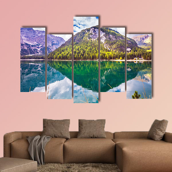 Emerald expanse of water reflects the surrounding canvas wall art