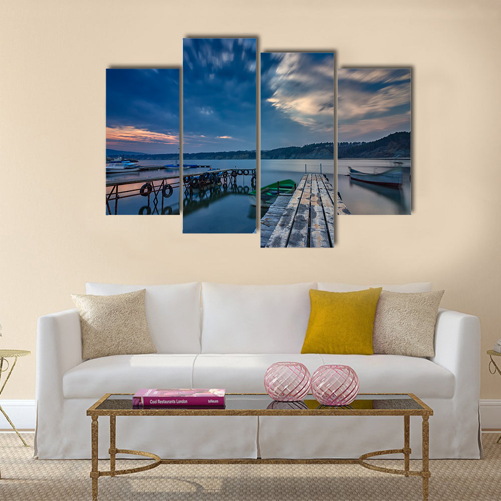exciting long exposure seascape on harbor with wooden pier and boat multi panel canvas wall art