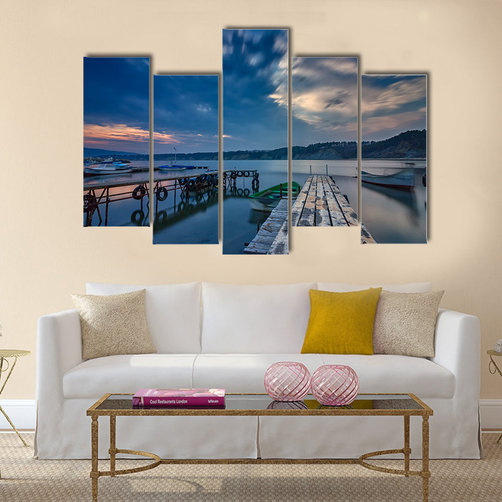 exciting long exposure seascape on harbor with wooden pier and boat multi panel canvas wall art