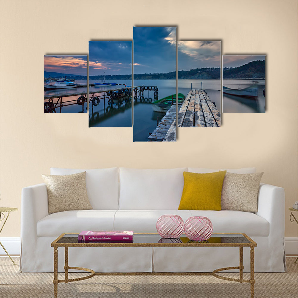 exciting long exposure seascape on harbor with wooden pier and boat multi panel canvas wall art