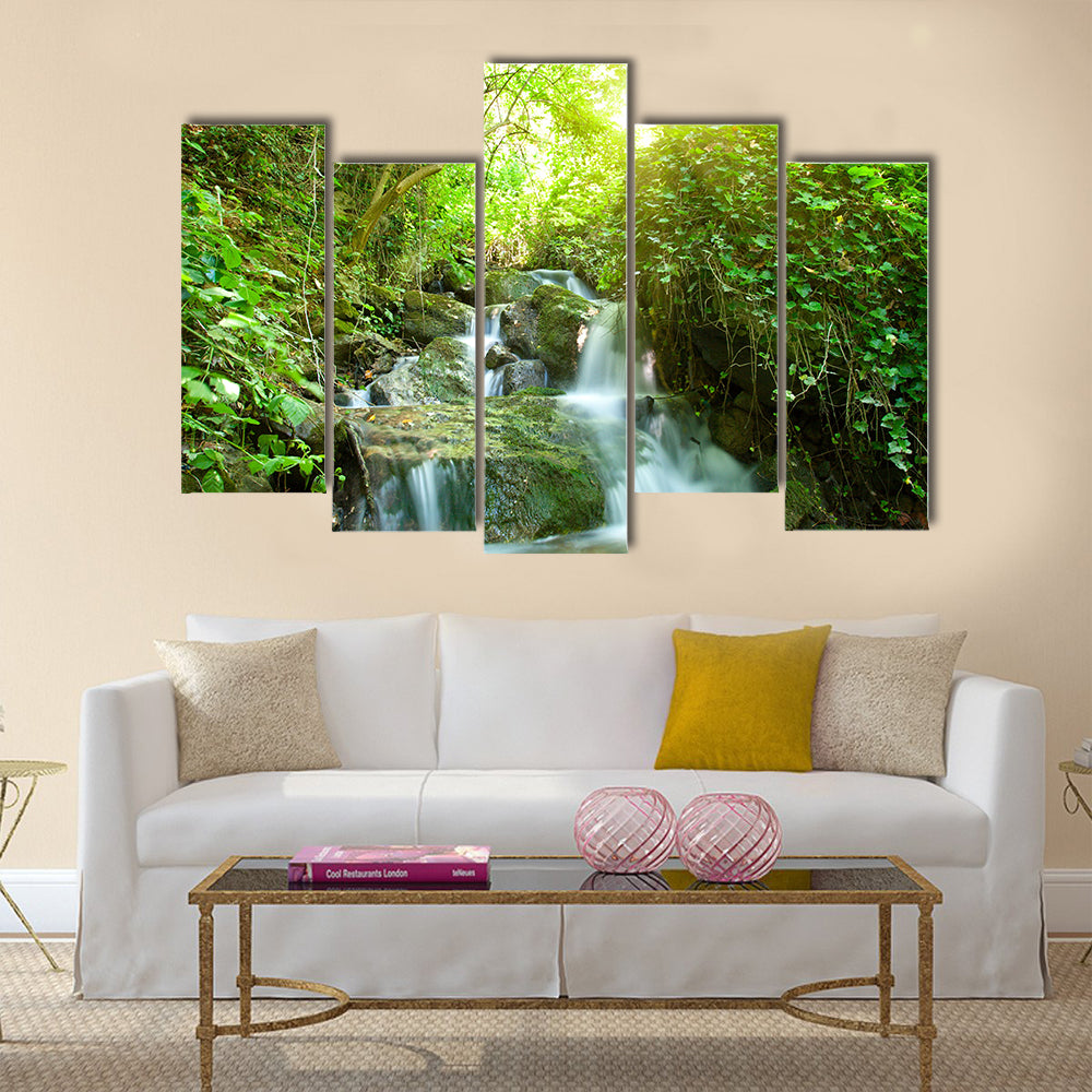 Beautiful waterfall on small forest stream Multi Panel Canvas Wall Art