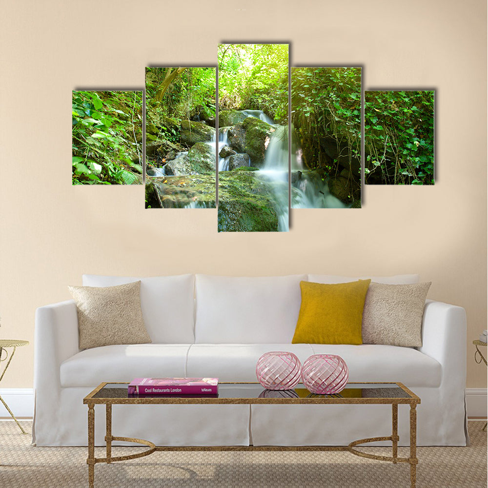 Beautiful waterfall on small forest stream Multi Panel Canvas Wall Art