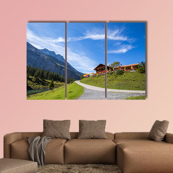 The panorama in summer view over the Oeschinensee multi panel canvas wall art