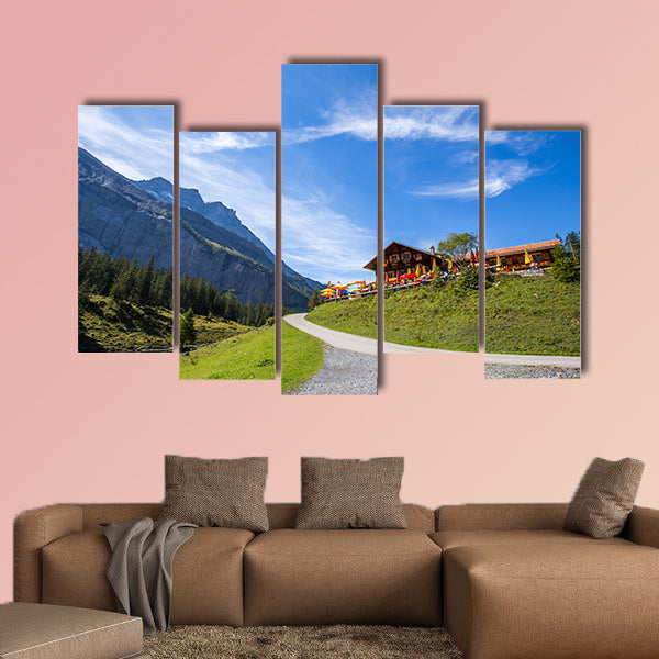 The panorama in summer view over the Oeschinensee multi panel canvas wall art