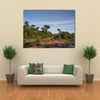 African river crossing the forest with ancient bridge Multi panel canvas wall art