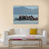 Refugee migrants, arrived on Lesvos in inflatable dinghy boats Multi Panel Canvas Wall Art