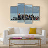 Refugee migrants, arrived on Lesvos in inflatable dinghy boats Multi Panel Canvas Wall Art